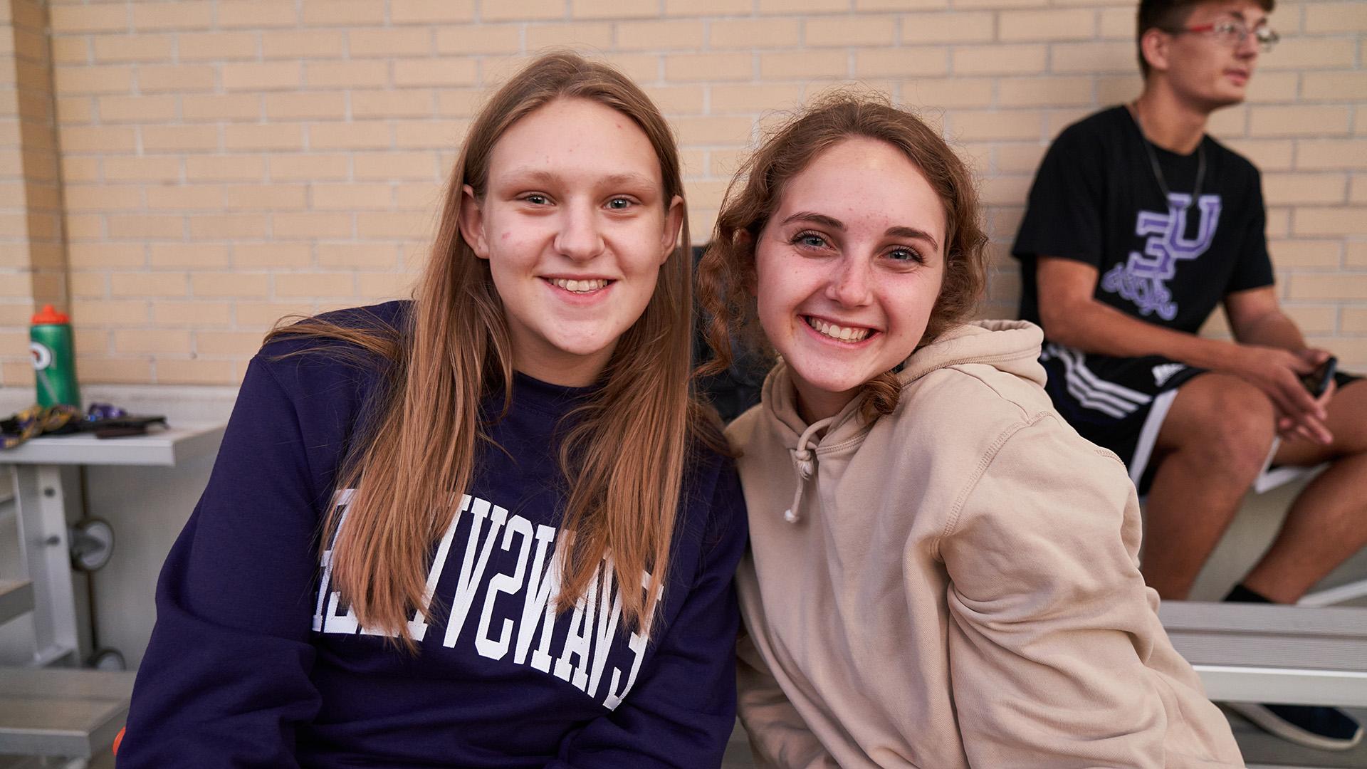 Students sitting in bleachers